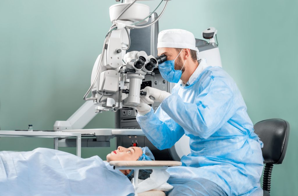 A male surgeon prepares a patient's eye for laser eye surgery