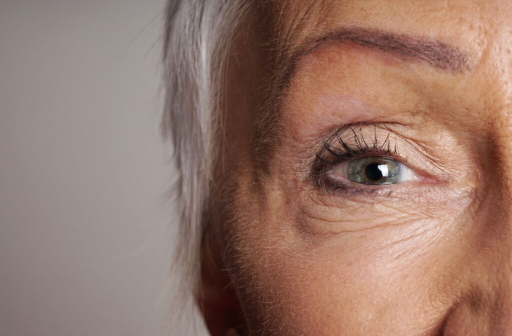 Close-up of an older woman’s eye, showing fine lines and detail around the eye area.